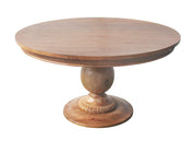 Wooden round table with a pedestal base on a white background